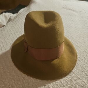 100% Wool- Beautiful camel-colored fedora. Great condition.